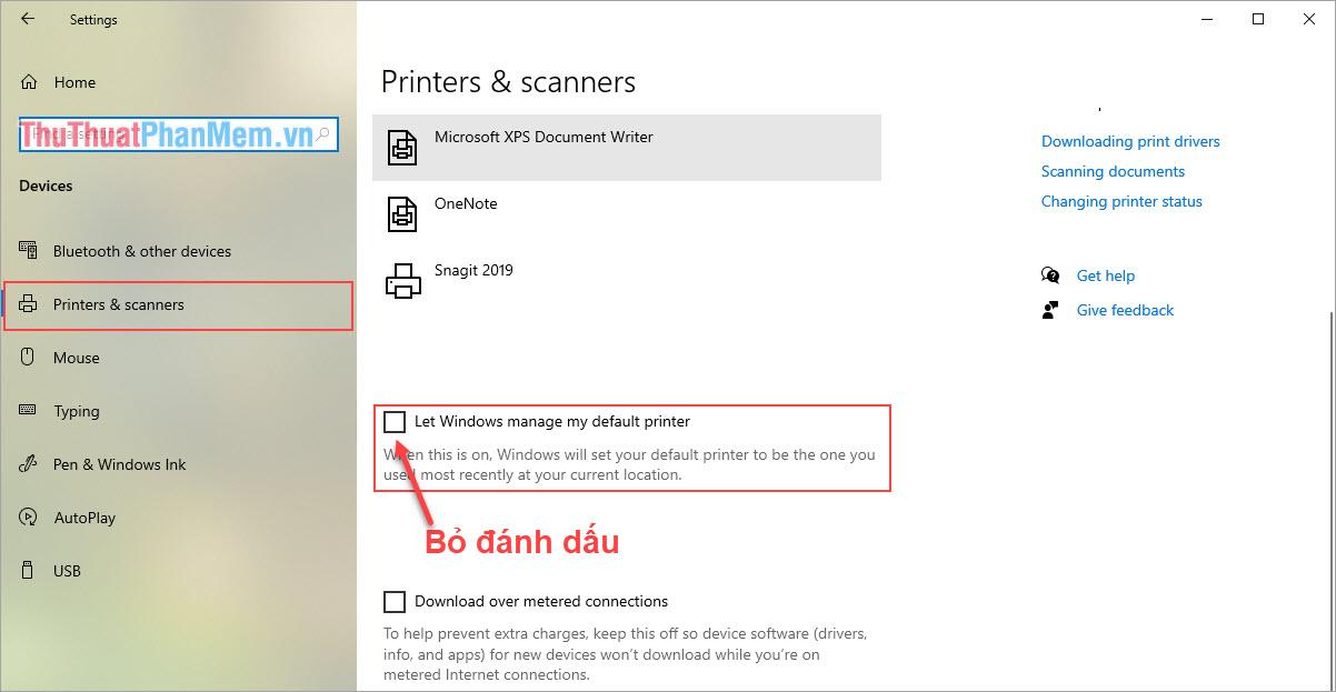 Bỏ chọn mục Let Windows manager my default printer