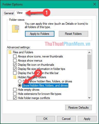 Chọn sang thẻ View, tích chọn mục Show hidden files, folder, and drives